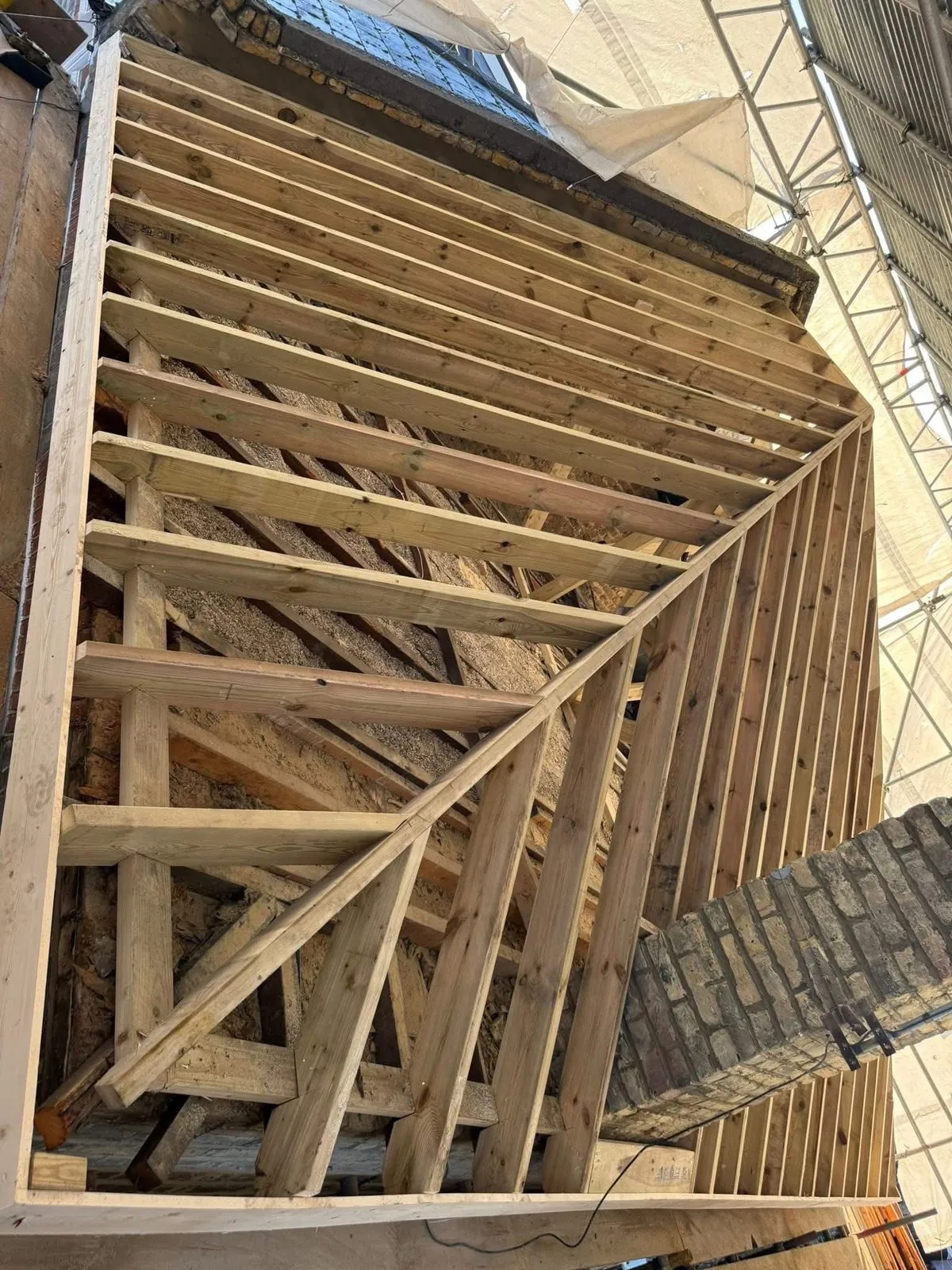 New roof timbers and rafters during a re-roof in Boscastle