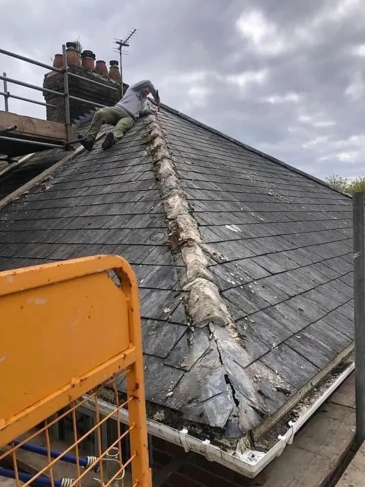 Slate roof ridge and chimney repair in Boscastle